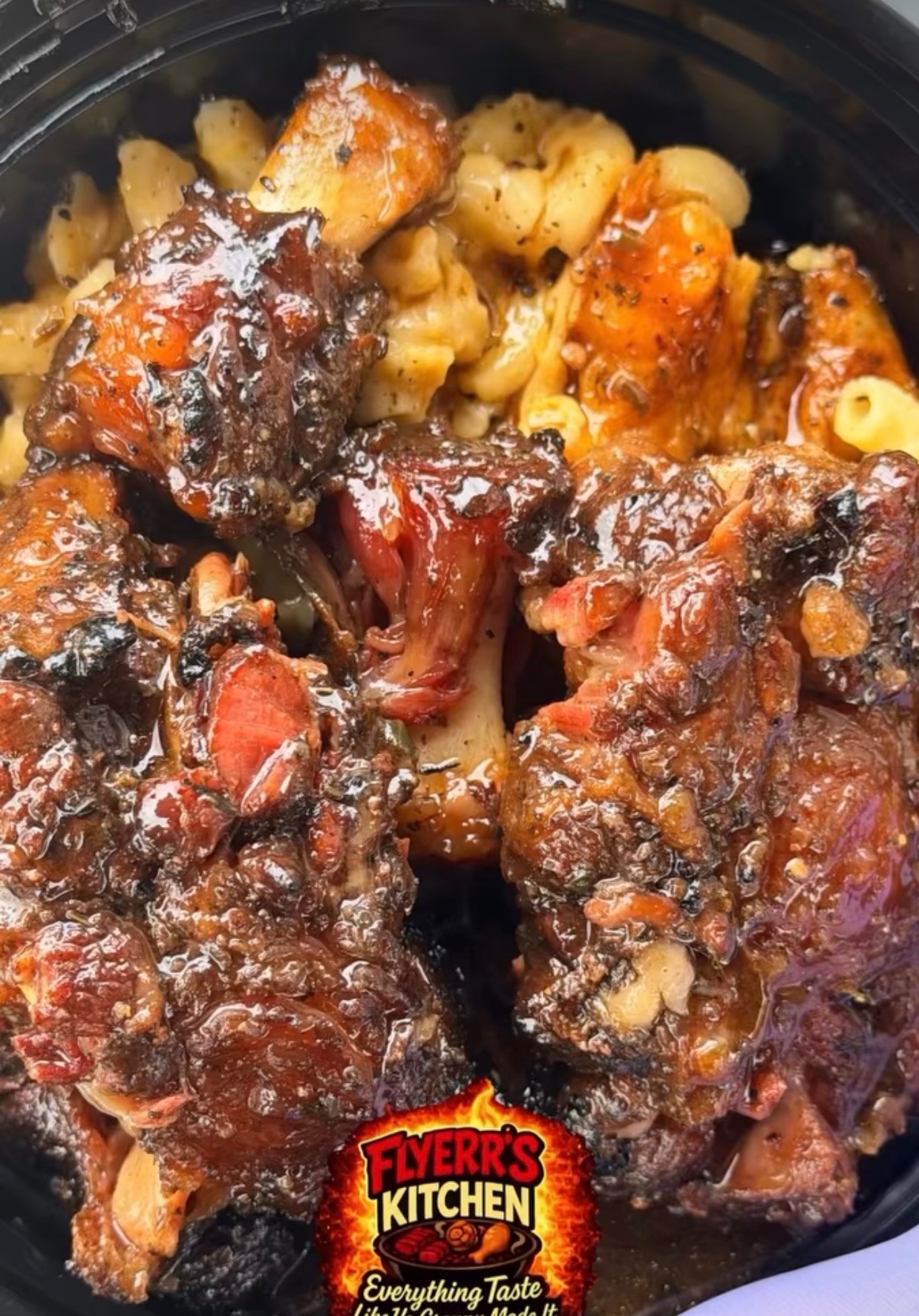 Oxtails over Mac & Cheese
